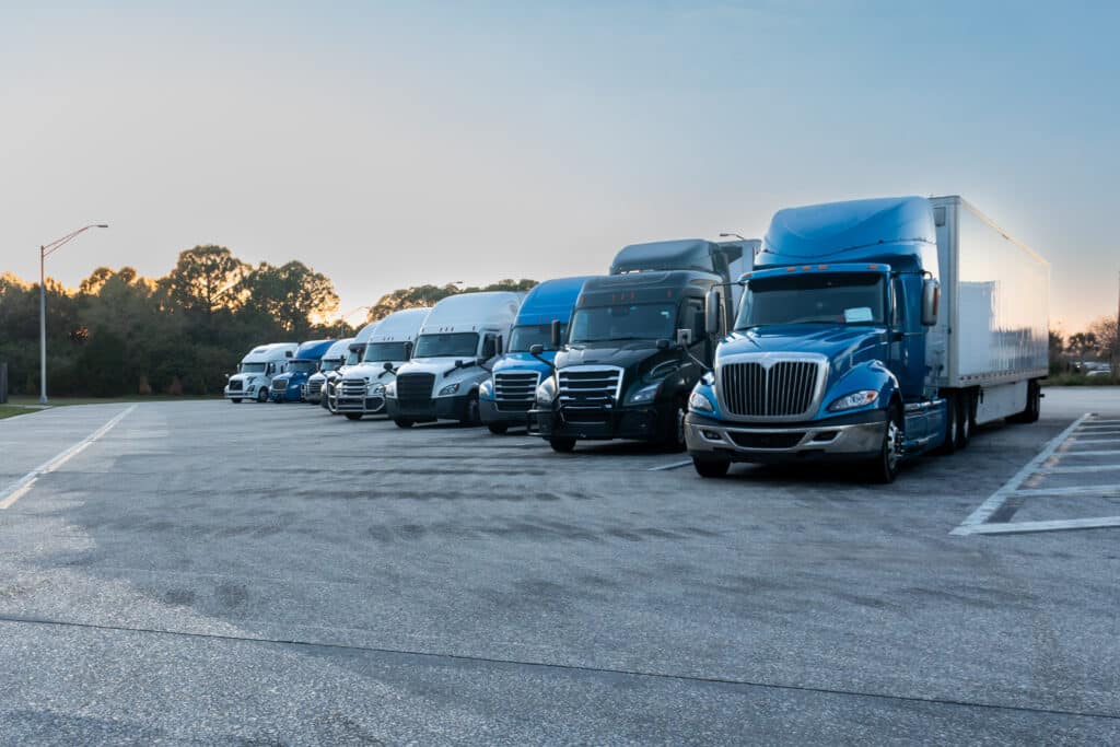 semi trucks parked at rest stop