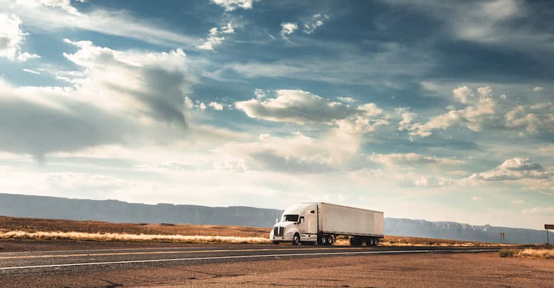 semi truck on desert road