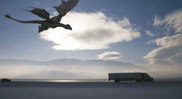 dragon flying over semi truck