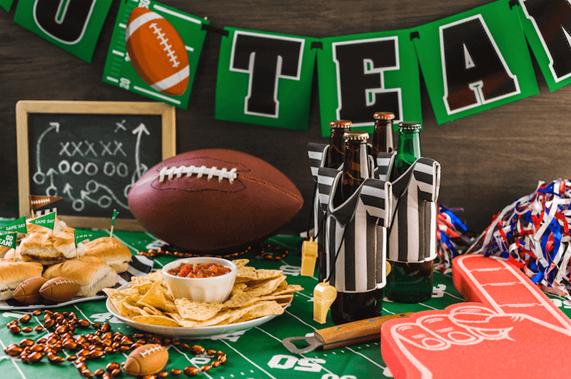 football tailgate party with food and decor