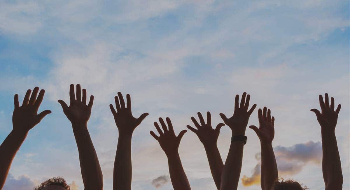 raised hands in celebration