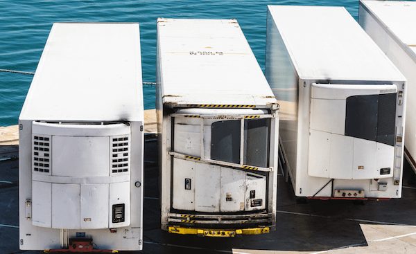 reefer trucks parked at the dock