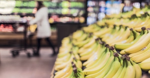 bananas on display in grocery store