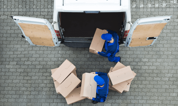 workers unloaded boxes from truck