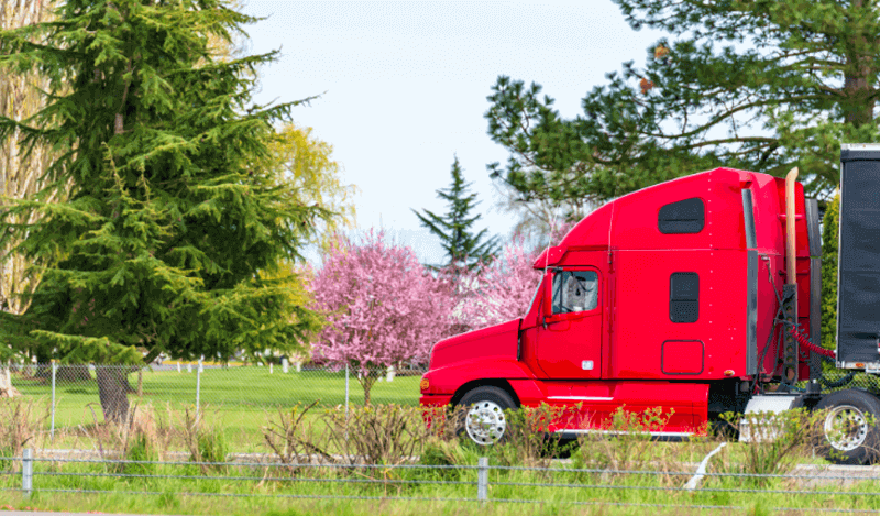 truck driving on scenic road