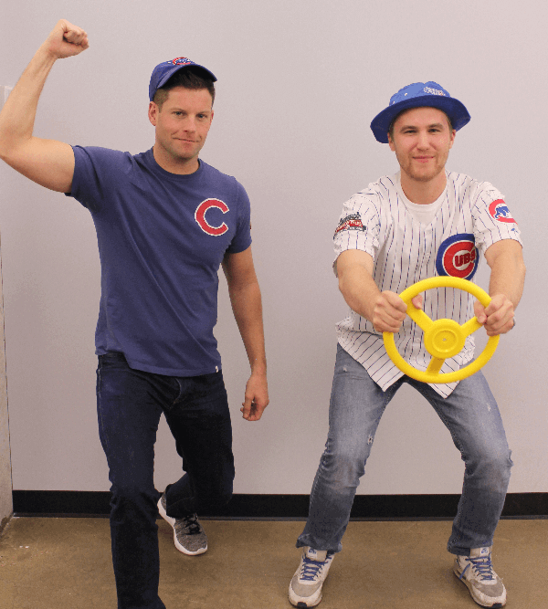 two men dressed in cubs gear
