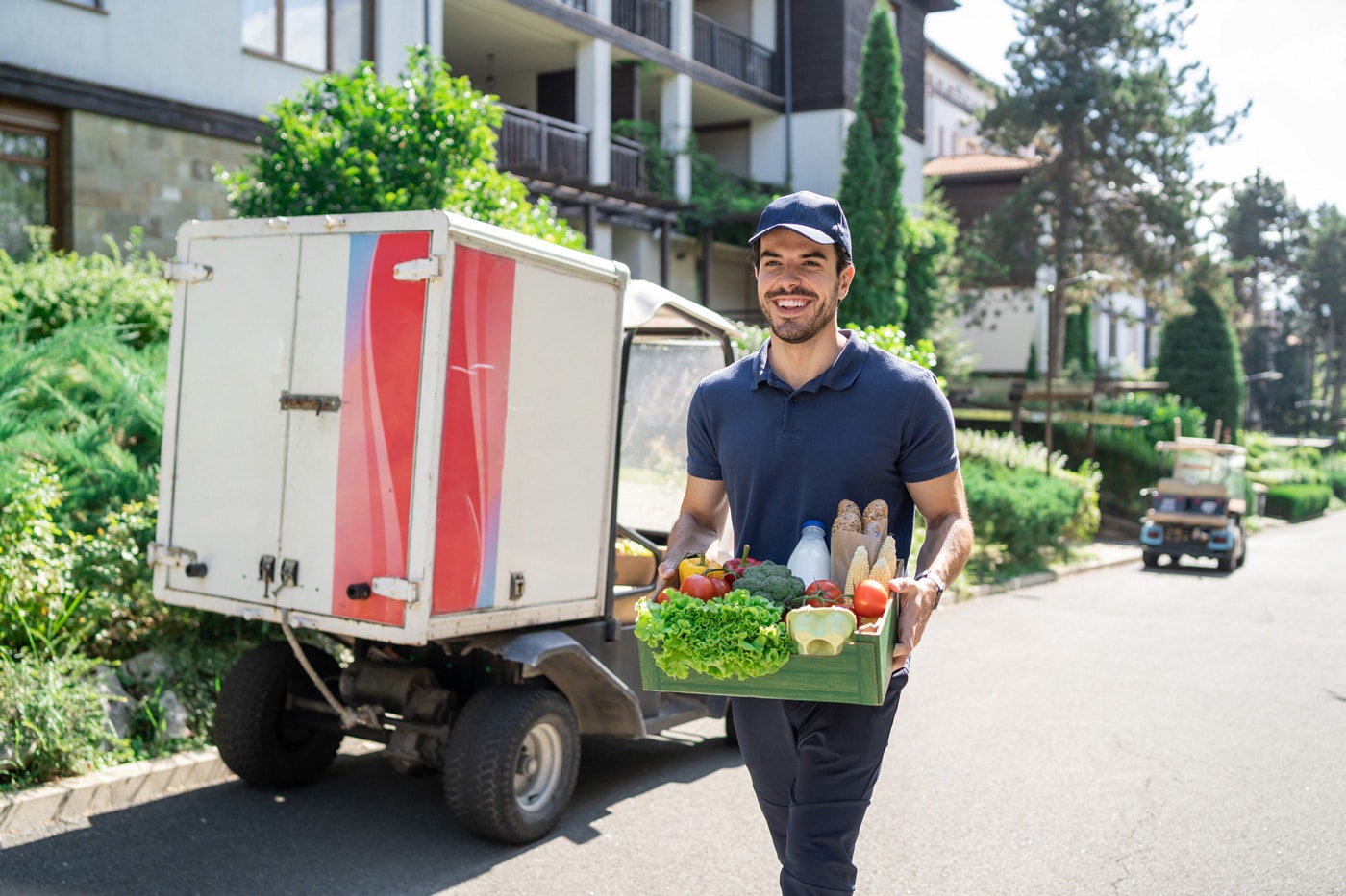 Grocery courier walking to his next delivery