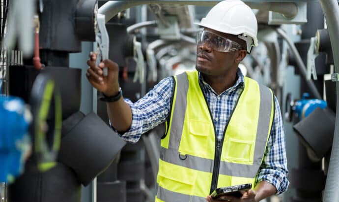 Capstone rep inspecting in a industrial warehouse