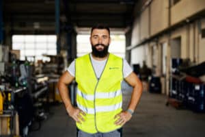 Capstone Logistics warehouse worker standing confidently