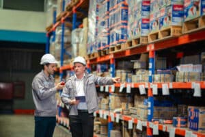 warehouse operation leaders going through inventory