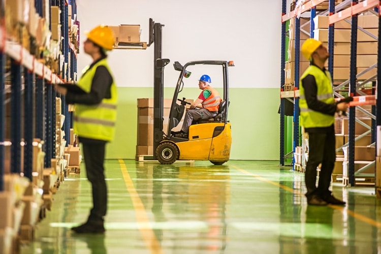 warehouse associates performing various activities including driving a forklift